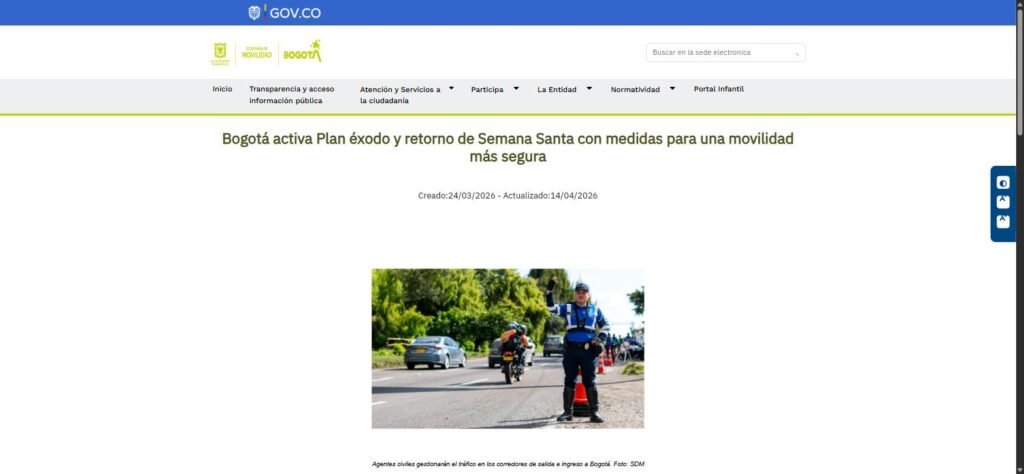 Agente civil de tránsito gestionando el tráfico en corredor de salida de Bogotá durante Semana Santa